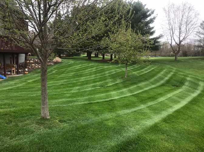 Commercial lawn mowing in Oshtemo Township, Michigan